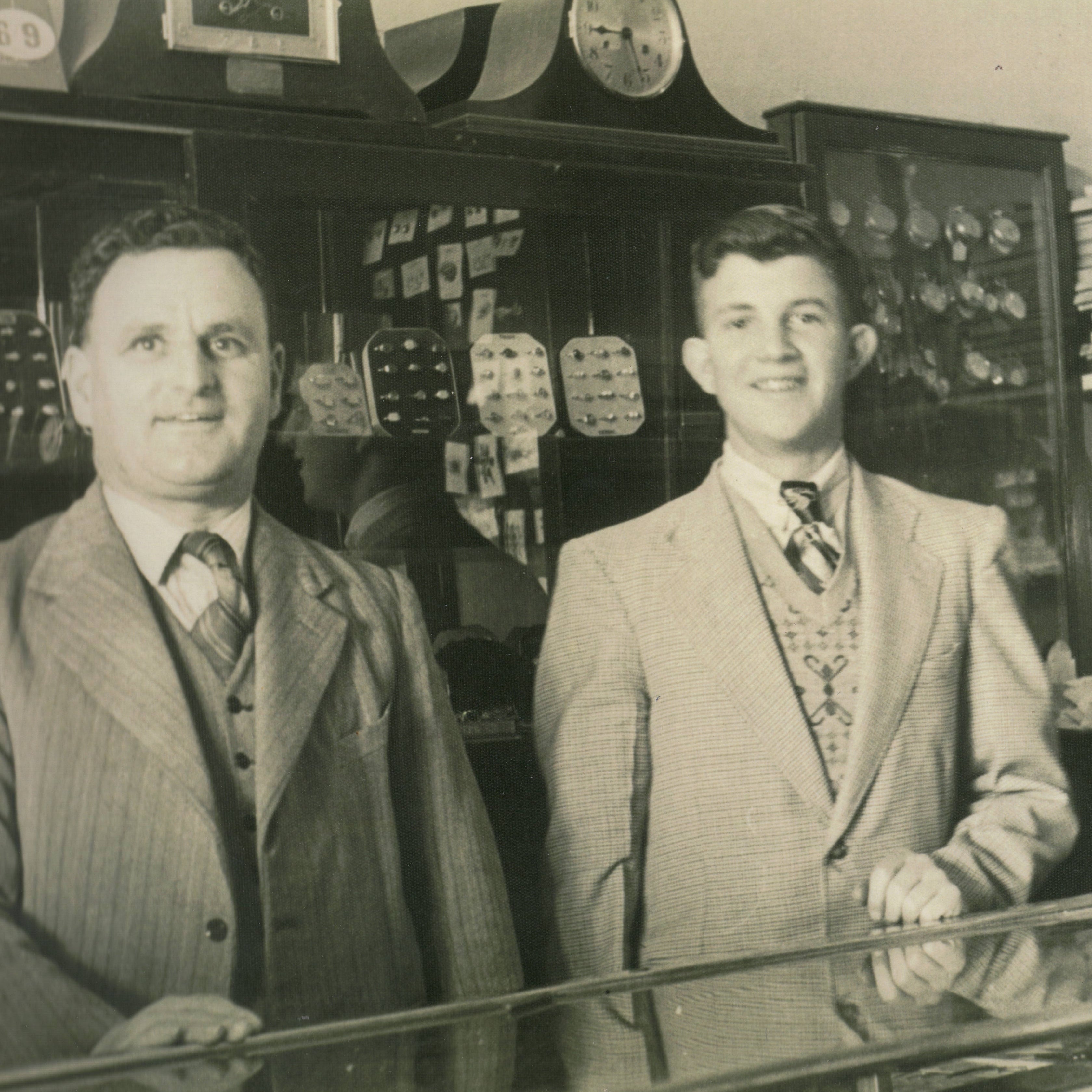 Robert Watson (left) stands with his son Ray in the 1950's in their RH Watson Jewellers store in St John Street Launceston. 